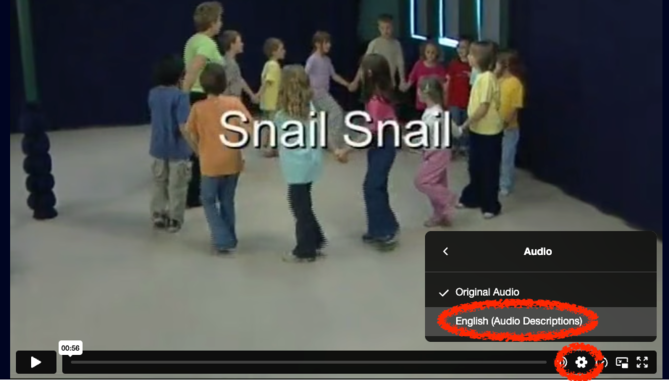 Video player screenshot highlighting how to select "English (Audio Descriptions)" from the audio settings.